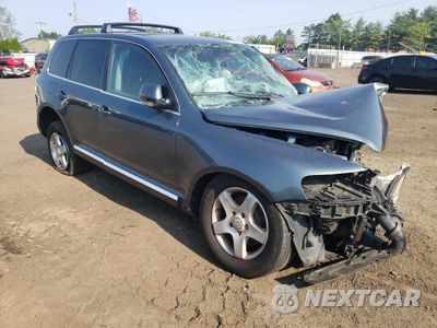 Czwarte zdjęcie samochodu z boku: 2004 VOLKSWAGEN TOUAREG 3.2 VIN:WVGZC67L34D001669 - miniatura