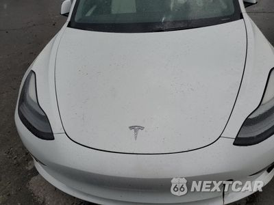 Zdjęcie 11 z 14 samochodu: 2021 TESLA MODEL 3 VIN:5YJ3E1EB3MF999882 - miniatura