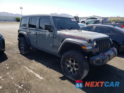 Czwarte zdjęcie samochodu z boku: 2022 JEEP WRANGLER UNLIMITED RUBICON VIN:1C4HJXFG5NW194638 - miniatura