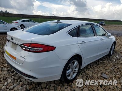 Trzecie zdjęcie samochodu z tyłu: 2018 FORD FUSION SE HYBRID VIN:3FA6P0LU9JR171700 - miniatura