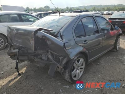 Trzecie zdjęcie samochodu z tyłu: 2003 VOLKSWAGEN JETTA GLS VIN:3VWSK69M43M048983 - miniatura