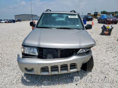Piąte zdjęcie samochodu w środku: 2004 ISUZU RODEO S VIN:4S2CK58W044303313 - miniatura