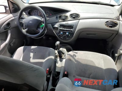 Zdjęcie 8 z 13 samochodu: 2001 FORD FOCUS LX VIN:1FAFP33P51W122583 - miniatura