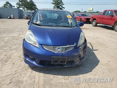 Piąte zdjęcie samochodu w środku: 2010 HONDA FIT SPORT VIN:JHMGE8H46AS028119 - miniatura
