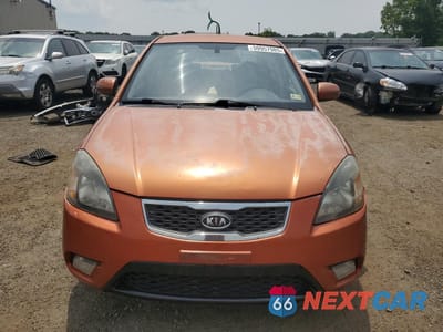 Piąte zdjęcie samochodu w środku: 2010 KIA RIO LX VIN:KNADH4A36A6674417 - miniatura