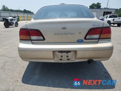 Zdjęcie 6 z 14 samochodu: 1997 NISSAN MAXIMA GLE VIN:JN1CA21D0VT853868 - miniatura