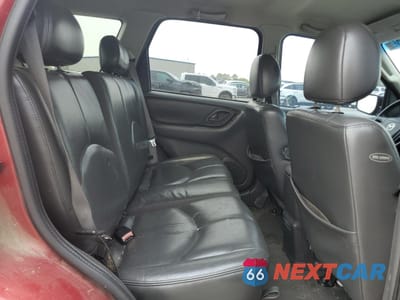 Zdjęcie 11 z 15 samochodu: 2003 MAZDA TRIBUTE ES VIN:4F2CZ061X3KM16343 - miniatura