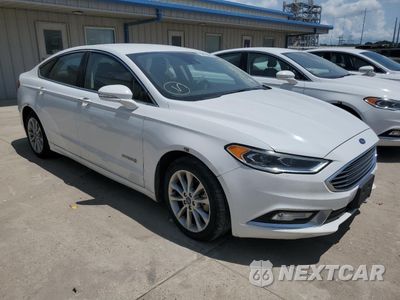 Czwarte zdjęcie samochodu z boku: 2017 FORD FUSION SE HYBRID VIN:3FA6P0LU3HR409258 - miniatura