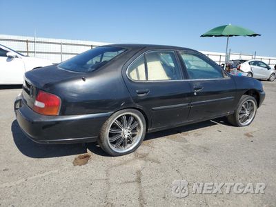 Trzecie zdjęcie samochodu z tyłu: 1999 NISSAN ALTIMA XE VIN:1N4DL01D1XC143886 - miniatura