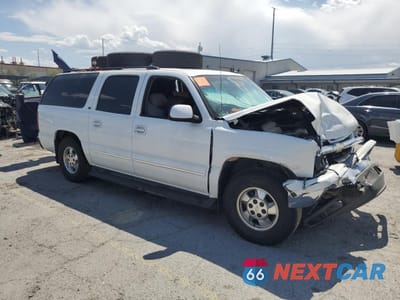 Czwarte zdjęcie samochodu z boku: 2003 CHEVROLET SUBURBAN C1500 VIN:3GNEC16T83G155598 - miniatura