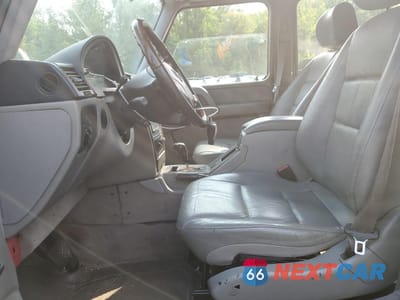 Zdjęcie 7 z 13 samochodu: 2003 MERCEDES-BENZ G 500 VIN:WDCYR49E83X135263 - miniatura