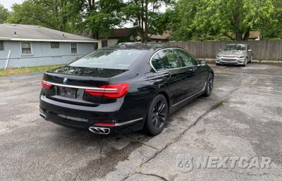 Czwarte zdjęcie samochodu z boku: 2016 BMW 750 XI VIN:WBA7F2C53GG419295 - miniatura