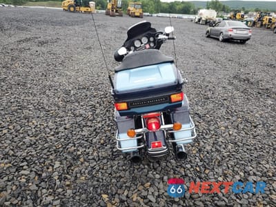Czwarte zdjęcie samochodu z boku: 2004 HARLEY-DAVIDSON FLHTCUI SHRINE VIN:1HD1FLW104Y618087 - miniatura
