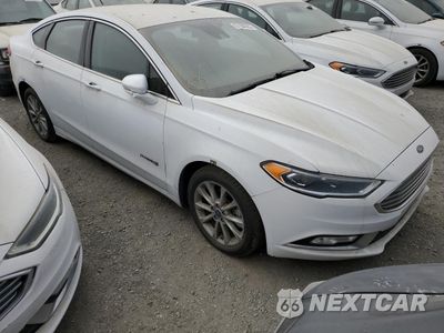 Czwarte zdjęcie samochodu z boku: 2017 FORD FUSION SE HYBRID VIN:3FA6P0LUXHR408964 - miniatura