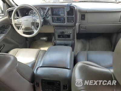 Zdjęcie 8 z 13 samochodu: 2005 GMC YUKON XL DENALI VIN:1GKFK66U95J113369 - miniatura