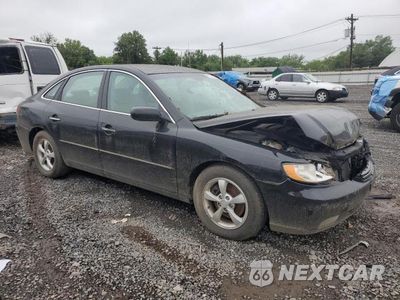 Czwarte zdjęcie samochodu z boku: 2007 HYUNDAI AZERA SE VIN:KMHFC46F97A141184 - miniatura