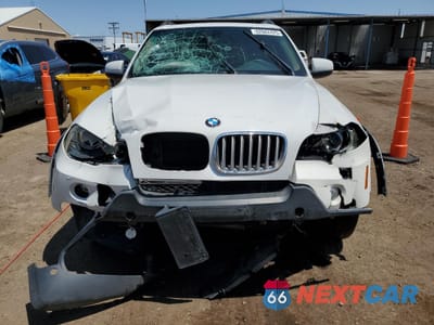Piąte zdjęcie samochodu w środku: 2008 BMW X5 4.8I VIN:5UXFE83548L167603 - miniatura