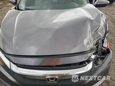 Zdjęcie 11 z 12 samochodu: 2018 HONDA CIVIC LX VIN:19XFC2F51JE023456 - miniatura