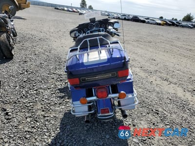 Czwarte zdjęcie samochodu z boku: 2007 HARLEY-DAVIDSON FLHTCUI VIN:1HD1FC4307Y677830 - miniatura