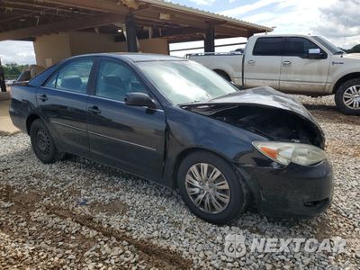 Czwarte zdjęcie samochodu z boku: 2002 TOYOTA CAMRY LE VIN:JTDBE32K120063072 - miniatura