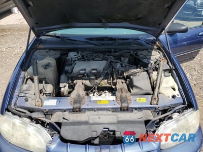Zdjęcie 11 z 13 samochodu: 1999 CHEVROLET LUMINA BASE VIN:2G1WL52M0X1101254 - miniatura