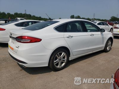 Trzecie zdjęcie samochodu z tyłu: 2018 FORD FUSION SE HYBRID VIN:3FA6P0LU9JR171972 - miniatura
