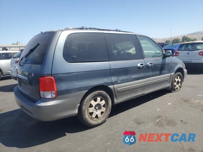 Trzecie zdjęcie samochodu z tyłu: 2002 KIA SEDONA EX VIN:KNDUP131526310930 - miniatura