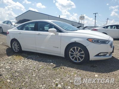 Czwarte zdjęcie samochodu z boku: 2017 FORD FUSION SE HYBRID VIN:3FA6P0LU3HR409082 - miniatura