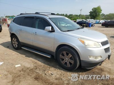Czwarte zdjęcie samochodu z boku: 2011 CHEVROLET TRAVERSE LT VIN:1GNKRGED1BJ339387 - miniatura