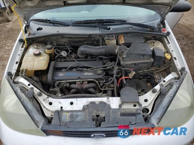 Zdjęcie 11 z 13 samochodu: 2003 FORD FOCUS ZX3 VIN:3FAFP31393R185434 - miniatura