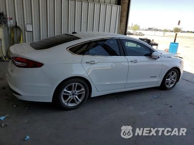Trzecie zdjęcie samochodu z tyłu: 2018 FORD FUSION SE HYBRID VIN:3FA6P0LUXJR129844 - miniatura