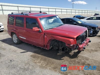 Czwarte zdjęcie samochodu z boku: 2010 JEEP COMMANDER LIMITED VIN:1J4RG5GT1AC137619 - miniatura