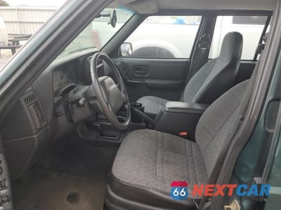 Zdjęcie 7 z 12 samochodu: 2000 JEEP CHEROKEE SPORT VIN:1J4FF48S9YL264540 - miniatura