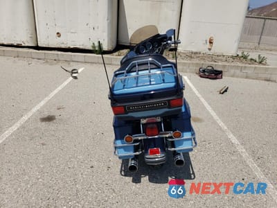 Czwarte zdjęcie samochodu z boku: 2000 HARLEY-DAVIDSON FLHTCUI SHRINE VIN:1HD1FLW34YY626801 - miniatura