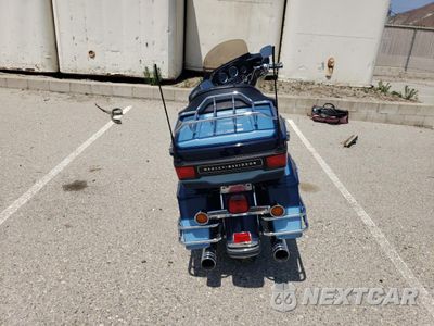 Czwarte zdjęcie samochodu z boku: 2000 HARLEY-DAVIDSON FLHTCUI SHRINE VIN:1HD1FLW34YY626801 - miniatura