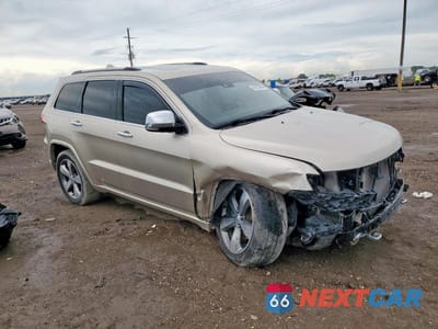 Czwarte zdjęcie samochodu z boku: 2014 JEEP GRAND CHEROKEE OVERLAND VIN:1C4RJECT3EC281403 - miniatura
