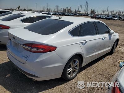 Trzecie zdjęcie samochodu z tyłu: 2018 FORD FUSION SE HYBRID VIN:3FA6P0LU3JR171577 - miniatura