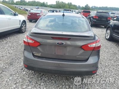 Zdjęcie 6 z 12 samochodu: 2012 FORD FOCUS TITANIUM VIN:1FAHP3J2XCL289073 - miniatura