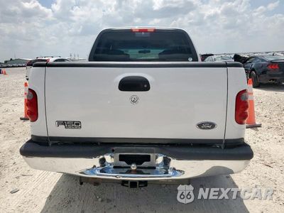 Zdjęcie 6 z 12 samochodu: 2002 FORD F150 SUPERCREW VIN:1FTRW07662KD61451 - miniatura