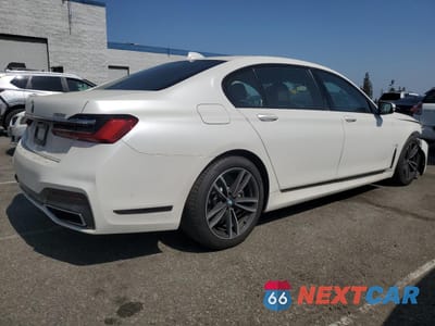 Trzecie zdjęcie samochodu z tyłu: 2020 BMW 750 XI VIN:WBA7U2C01LGM27383 - miniatura