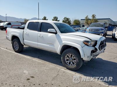 Czwarte zdjęcie samochodu z boku: 2017 TOYOTA TACOMA DOUBLE CAB VIN:3TMAZ5CN5HM051825 - miniatura