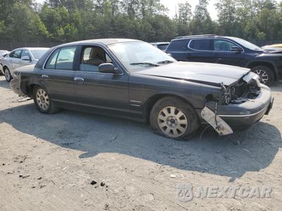 Czwarte zdjęcie samochodu z boku: 1999 FORD CROWN VICTORIA LX VIN:2FAFP74W8XX125486 - miniatura