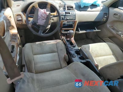 Zdjęcie 8 z 12 samochodu: 1998 NISSAN MAXIMA GLE VIN:JN1CA21D9WM909687 - miniatura