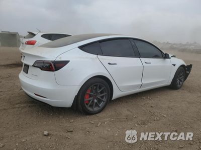 Trzecie zdjęcie samochodu z tyłu: 2022 TESLA MODEL 3 VIN:5YJ3E1EB6NF348201 - miniatura