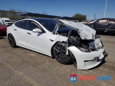 Czwarte zdjęcie samochodu z boku: 2023 TESLA MODEL S VIN:5YJSA1E5XPF517849 - miniatura