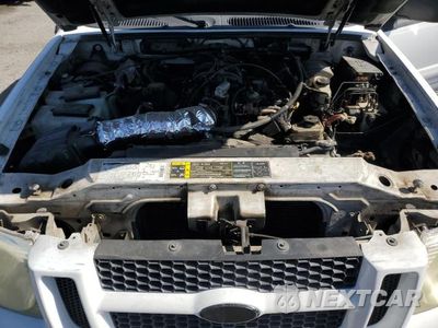 Zdjęcie 11 z 12 samochodu: 2002 FORD EXPLORER SPORT TRAC VIN:1FMZU67E22UD26793 - miniatura