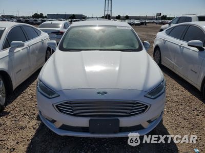 Piąte zdjęcie samochodu w środku: 2017 FORD FUSION SE HYBRID VIN:3FA6P0LU2HR409705 - miniatura