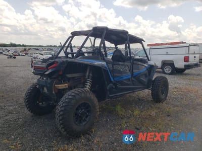 Czwarte zdjęcie samochodu z boku: 2023 POLARIS RZR XP 4 1000 PREMIUM VIN:3NSN4K990PH351948 - miniatura