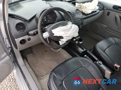 Zdjęcie 8 z 14 samochodu: 2003 VOLKSWAGEN NEW BEETLE GL TDI VIN:3VWBP21C03M433843 - miniatura