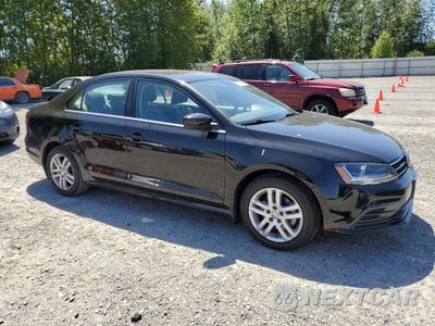 Czwarte zdjęcie samochodu z boku: 2017 VOLKSWAGEN JETTA S VIN:3VW2B7AJ8HM342515 - miniatura